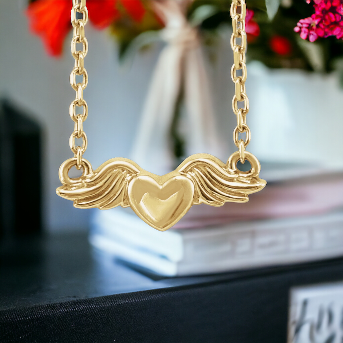 Front view of Eternal Love Heart with Angel Wings Necklace in 14k Yellow Gold with detailed heart and wings pendant.