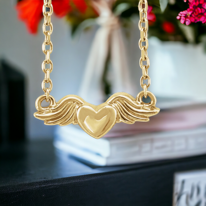 Front view of Eternal Love Heart with Angel Wings Necklace in 14k Yellow Gold with detailed heart and wings pendant.