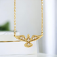 Front view of the Heavenly Peace Dove Diamond Necklace in 14k gold 