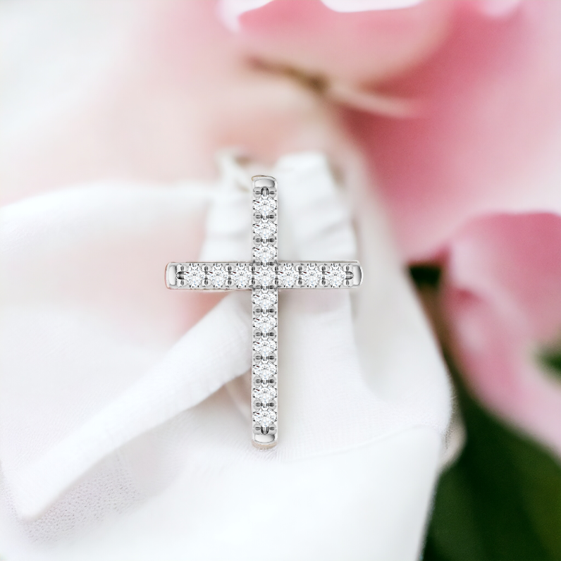 Silver diamond cross pendant with a clear front view, highlighting the brilliance of the diamonds and the purity of the design.