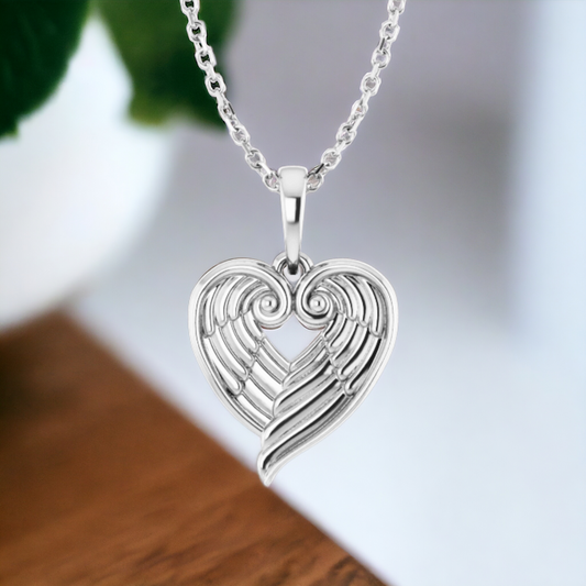 Front view of Eternal Embrace Angel Wing Heart Necklace in Sterling Silver with detailed heart and wings design, shown on matching chain.