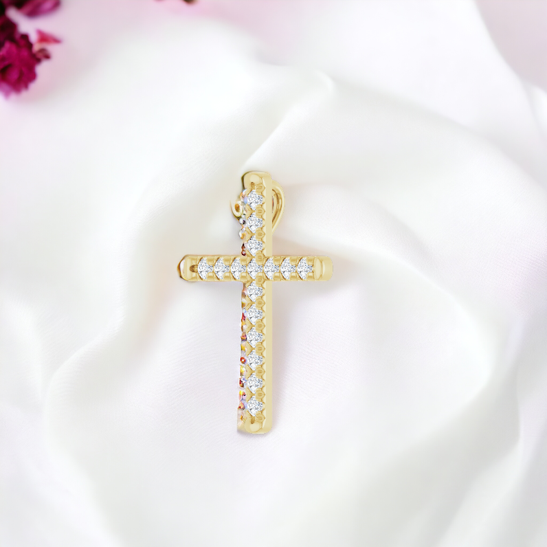 Close-up of the gold diamond cross necklace on a delicate chain, displayed against a soft pink floral background for a touch of grace.