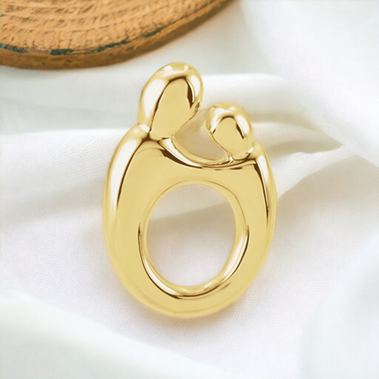 Polished 14k Gold Mother and Child Slide Pendant, elegantly crafted.