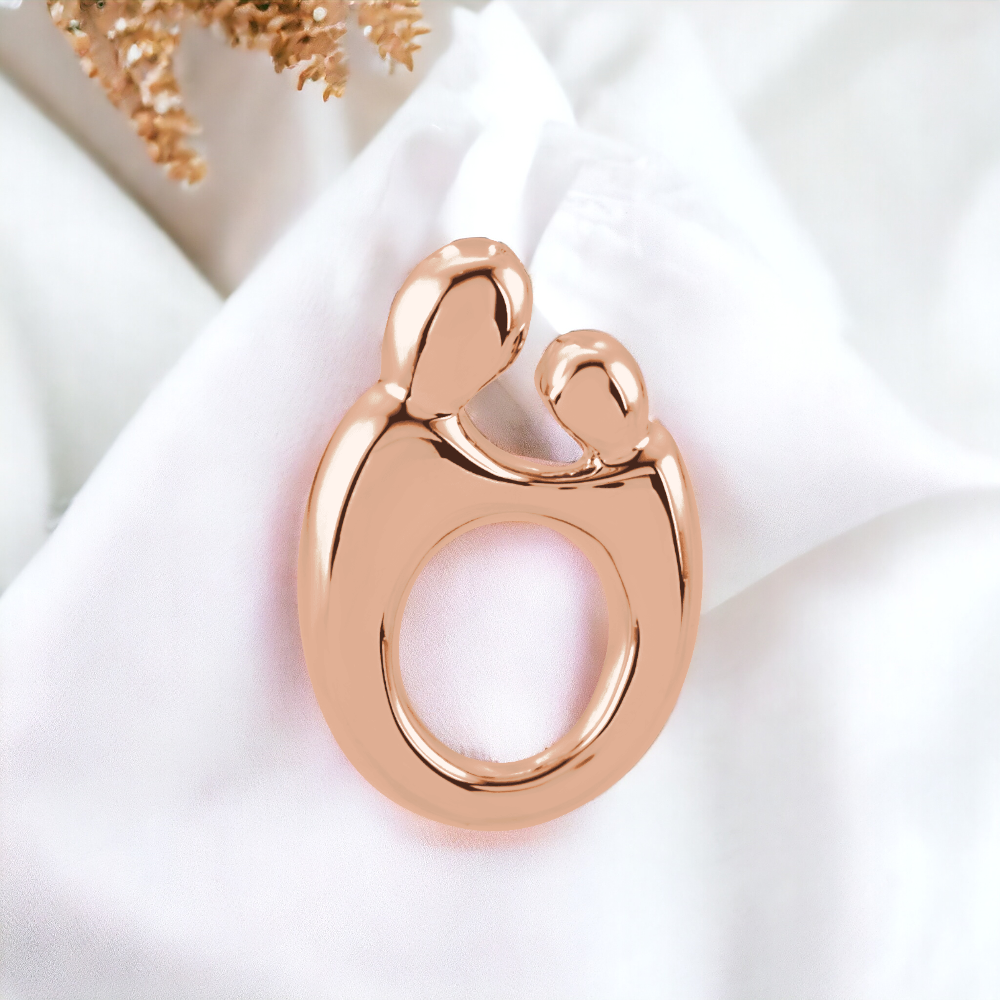 Close-up of Rose Gold Mother and Child Slide Pendant on a serene backdrop.