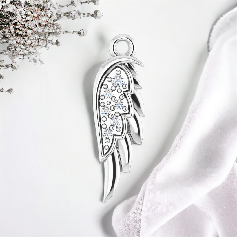 Sterling Silver angel wing pendant with diamond embellishments, presented on a pristine white surface for a sophisticated look.