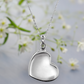 Sterling Silver  baby hand cremation ash necklace back.